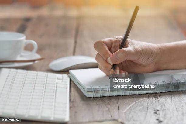 Woman Working At Old Wooden Table Stock Photo - Download Image Now - Handwriting, Writing - Activity, Creativity