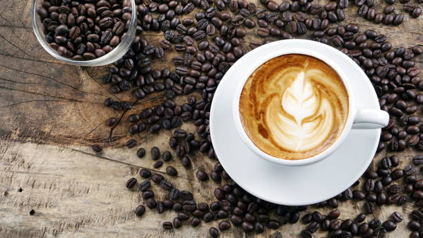 istock Latte, cappuccino or espresso coffee with roasted coffee beans 640299178
