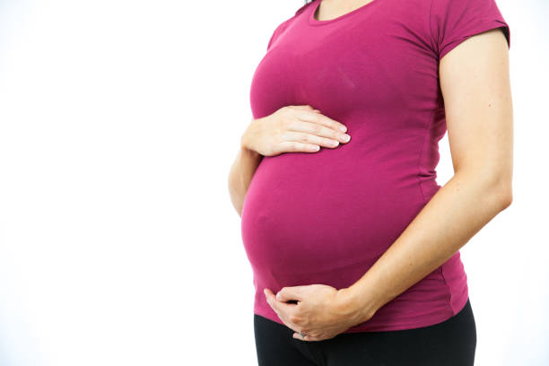 istock Pregnant Womans Torso 640299488