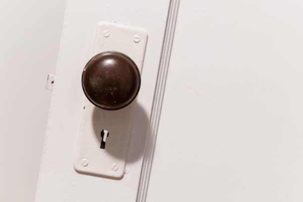 istock old wooden door with door knob 640299542