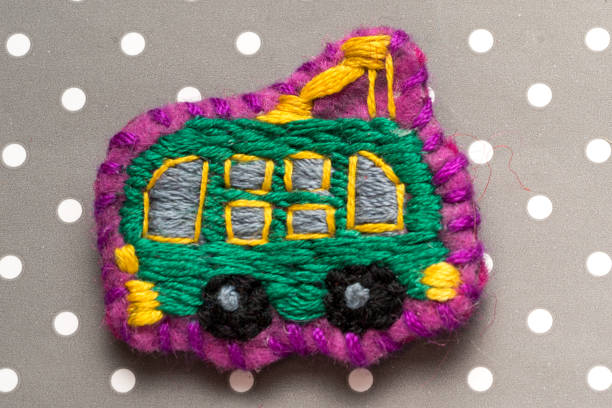 istock homemade embroidered trolleybus on a dots grey background 640302610