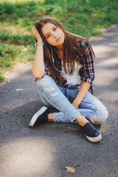istock young beautiful girl walking park 640305018