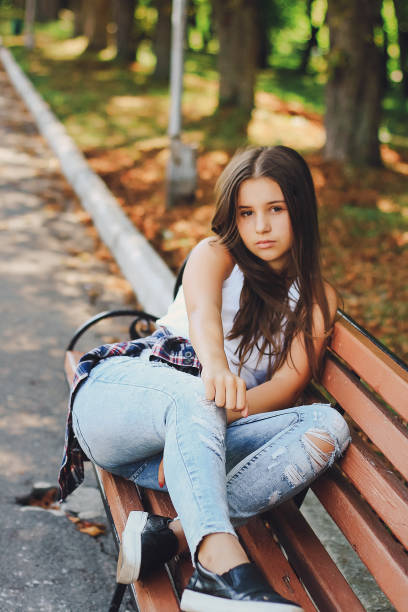 istock young beautiful girl walking park 640305494