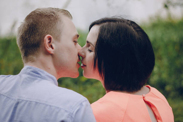 istock loving couple walking park 640308004