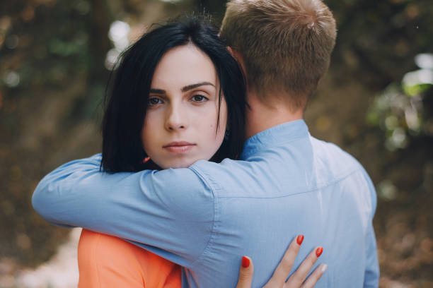 istock loving couple walking park 640308750