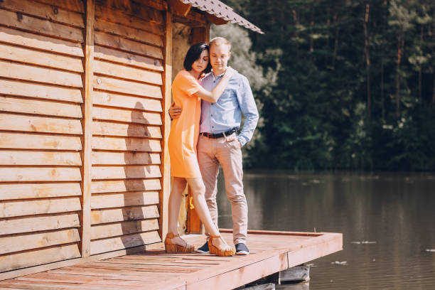 istock loving couple walking park 640309066