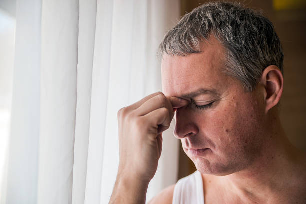 istock Sad and depressed businessman stand alone. 640309282