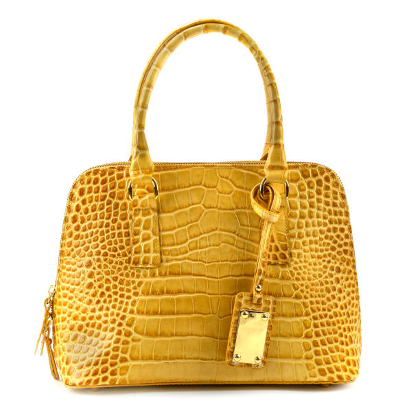 istock Elegant  Yellow   leather woman's handbag isolated on white background 640310454