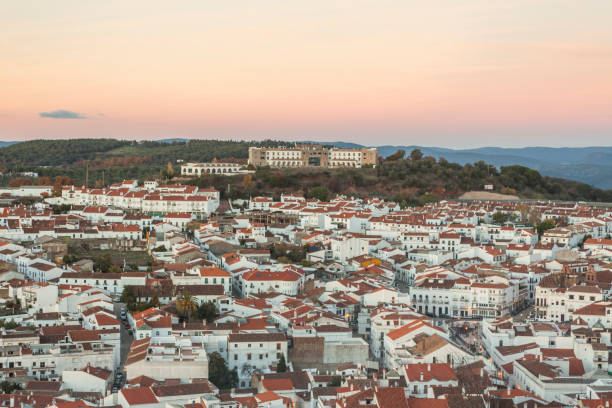 White architecture and red roofs in tourist Aracena's town. stock photo