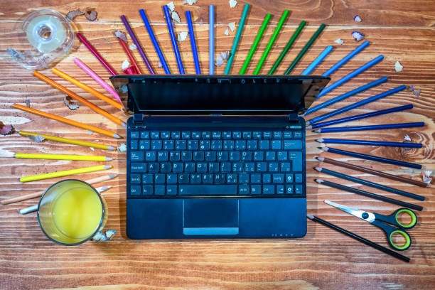 istock Graphic designer with laptop and color palette 640317932