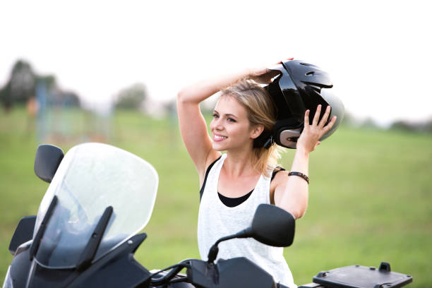 Women Motorcycle Blond Hair Long Hair Stock Photos, Pictures & Royalty-Free  Images - iStock