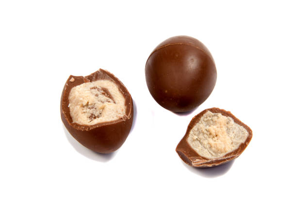 istock Chocolate candies isolated on white background. 640320160