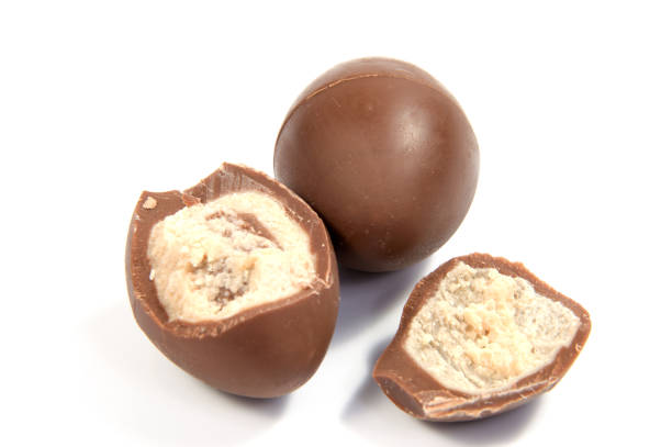 istock Chocolate candies isolated on white background. 640320218