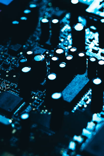 istock computer motherboard in blue dark background close-up 640321156