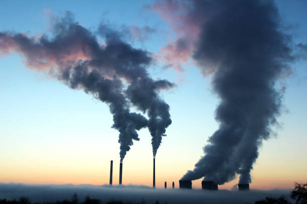 istock emission from coal powerplant during the sunset 640322764