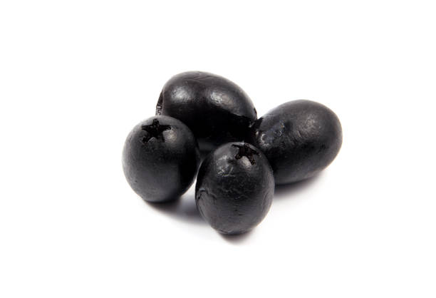 istock Black olives isolated on a white background 640322864