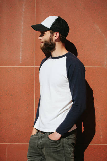 istock hipster wearing white blank t-shirt with space for your logo 640323336