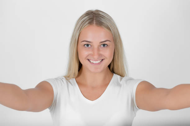 Casual woman in taking a selfie