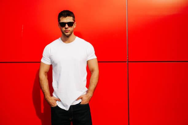 istock Hipster wearing white blank t-shirt with space for your logo 640323736