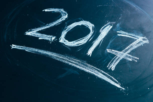 istock Year number 2017 written with the white chalk on the 640323952
