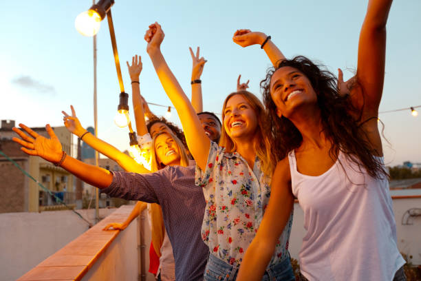 istock Multi ethnic friends dancing at the rooftop party 640325462