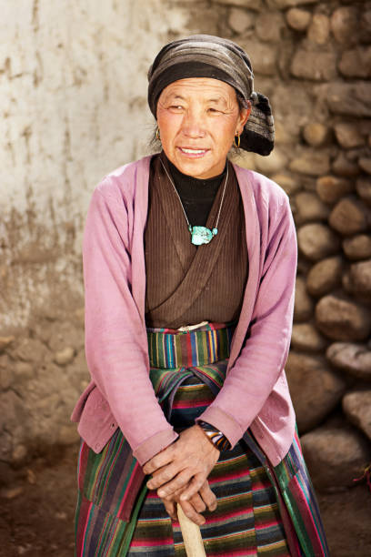 istock Tibetan woman at work. Mustang, Nepal. 640332346
