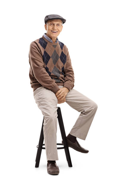 istock Elderly man sitting on a chair 640333494