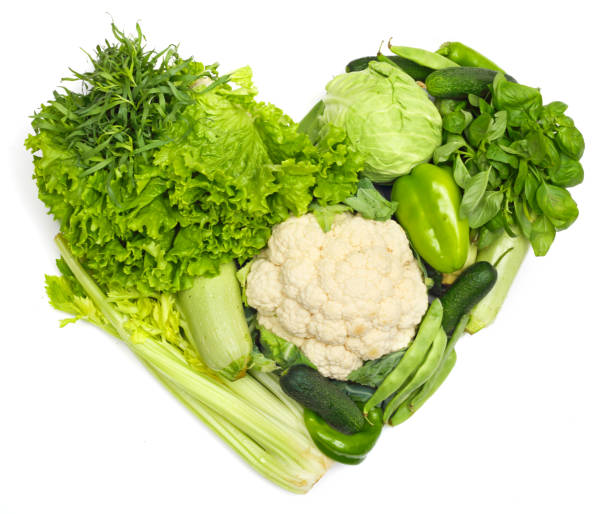 Heart of vegetables Pile of vegetables shaped as heart isolated on white background celery heart stock pictures, royalty-free photos & images