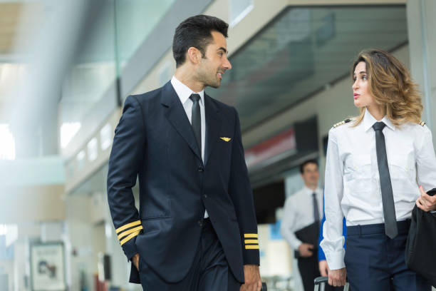 istock Cabin crew walking through the airport. 640336104