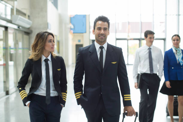 istock Cabin crew walking through the airport. 640336204