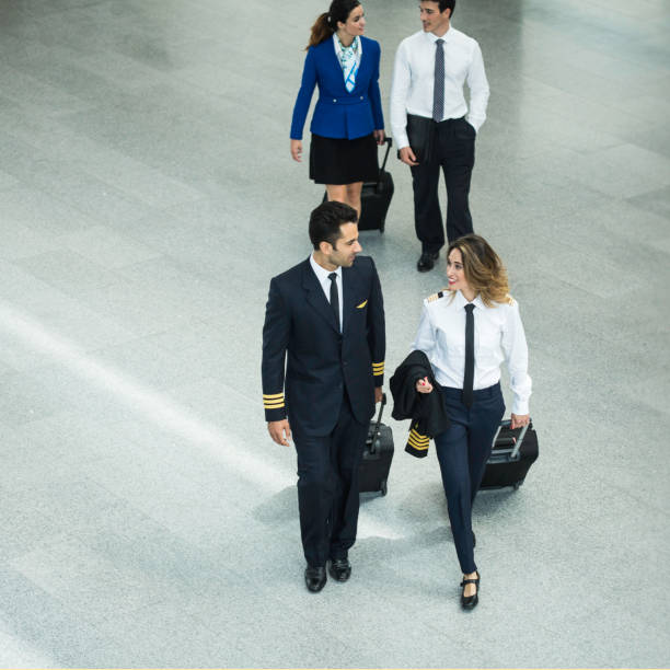 istock Cabin crew walking through the airport. 640336410