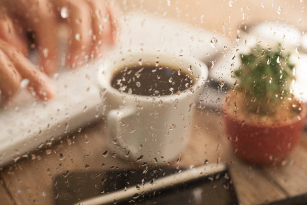 Office in city Business on office table with coffee rainy cafe stock pictures, royalty-free photos & images