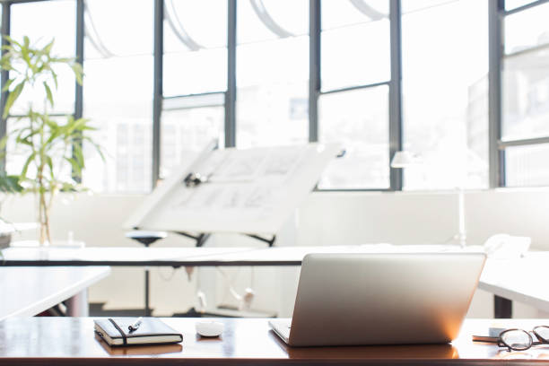 istock Note book and laptop on desk. 640343220