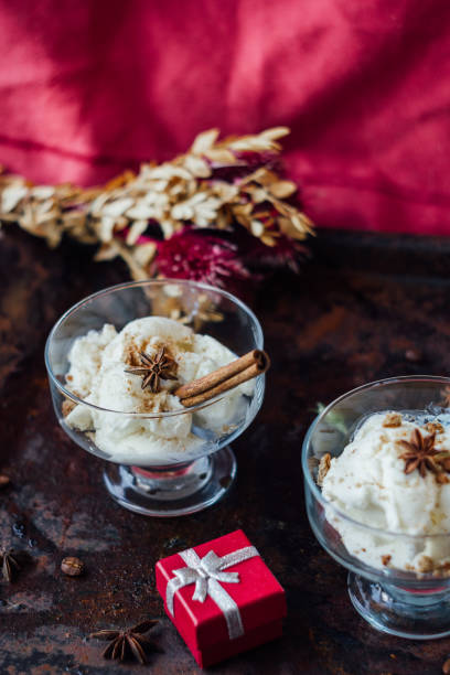 istock Delicious ice cream dessert in glass over black surface. 640344350