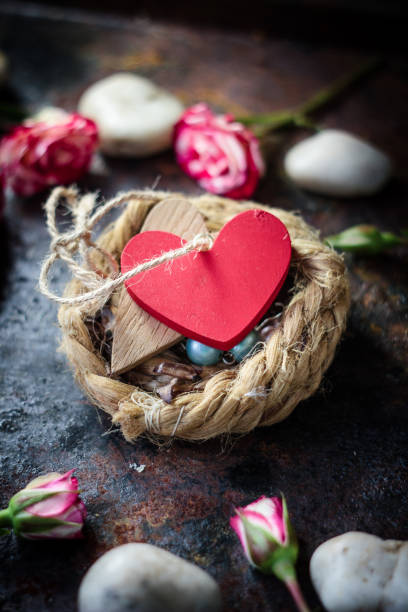 istock Two hearts bounded together on nest. 640345468