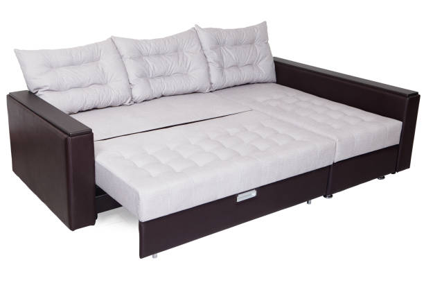 ホワイト、フルサイズ、アームレストの折りたたみ式ソファベッドは、ブラウンレザーレットを張り付けました。 - bedroom bed comfortable double bed ストックフォトと画像