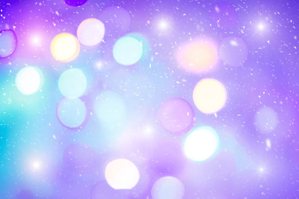 istock Defocused colorful ligths. Multicolored bokeh lights during a snowfall. 640351524