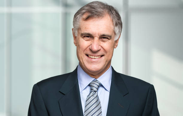 istock Smiling confident business man portrait 640353564