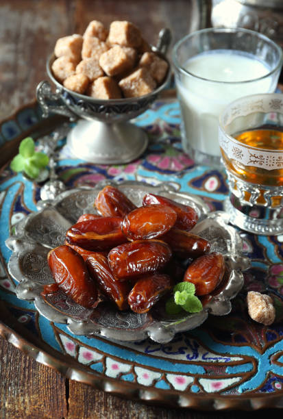 istock Ripe dates, green tea and fermented milk drink 640354394