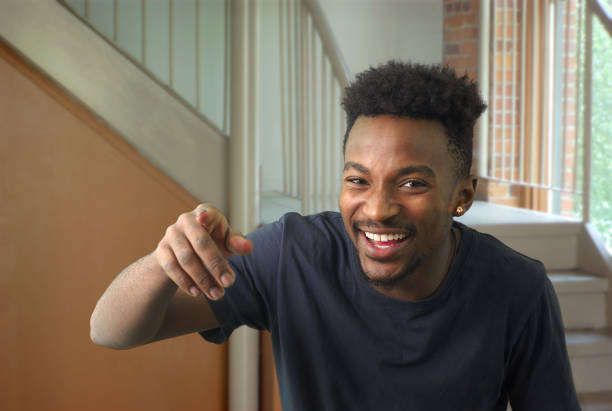 istock Young man pointing finger and laughing someone school 640742002