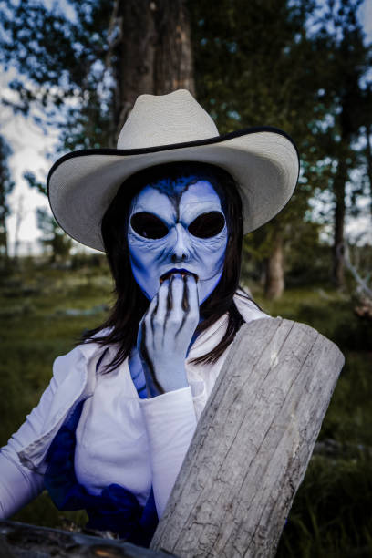 Evil Cowgirl Alien On A Ranch At Night Stock Photo - Download Image Now -  Bizarre, Actor, Futuristic - iStock