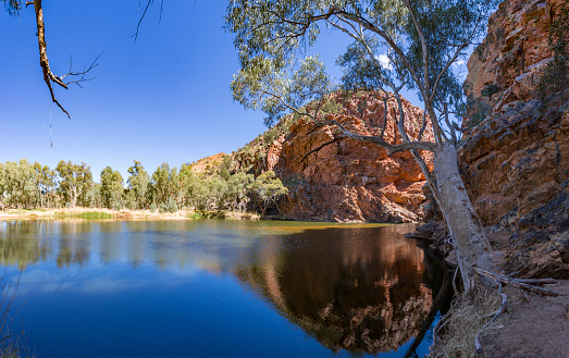 Panorama of the spectacular desert oasis of the Ellery Creek Big Hole waterhole in the Northern Territory, Australia