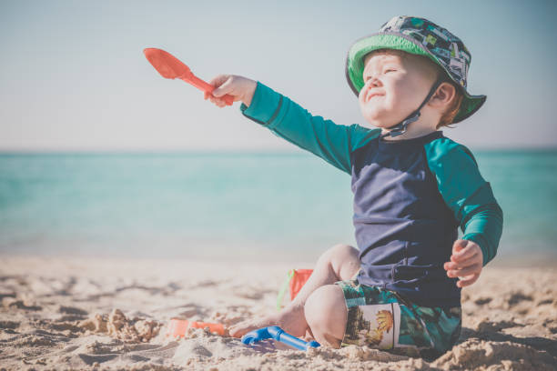 istock Baby Boy Playing on Tropical Beach, Cayo Coco, Cuba 640807046