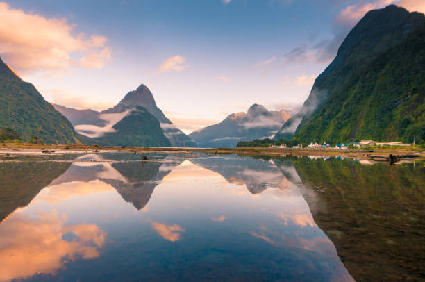 The Milford Sound fiord. Fiordland national park, New Zealand Famous Mitre Peak rising from the Milford Sound fiord. Fiordland national park, New Zealand milford sound stock pictures, royalty-free photos & images