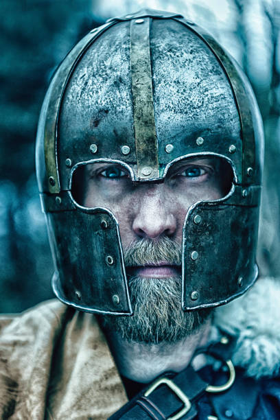 istock Viking warrior with beard wears helmet 640831200