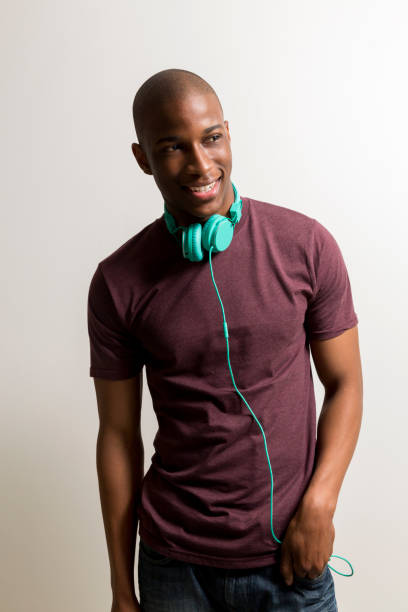 Happy man with headphones against white background