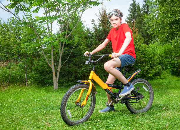 istock Kid on a bike outdoor 640835476