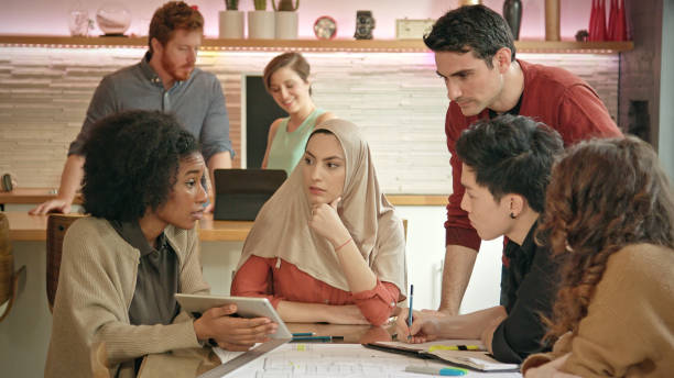 istock Muslim Businesswoman Leads Multi-Ethnic Team 640855636