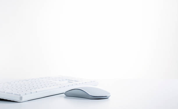 Computer keyboard with mouse White simple computer keyboard and mouse with large copy space. computer mouse photos stock pictures, royalty-free photos & images