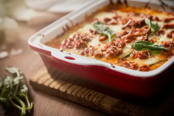A healthy gluten free zucchini lasagna with no noodles only vegetables, meat, and cheese.